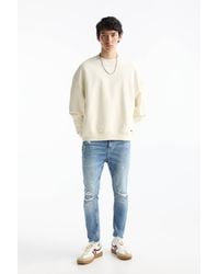 Pull&Bear - Ripped Carrot Fit Jeans - Lyst