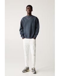 Pull&Bear - Ripped Carrot Fit Jeans - Lyst
