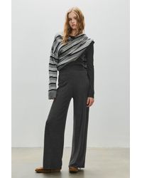 Pull&Bear - Broek Met Wijde Pijpen Van Soft Touch Materiaal - Lyst