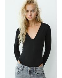Pull&Bear - V-Neck Bodysuit - Lyst