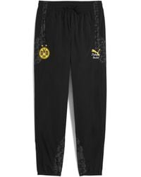 PUMA - Kidsuper X Borussia Dortmund Travel Broek Voor Zwart/Geel, Maat - Lyst