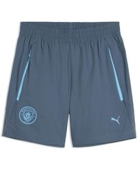 PUMA - Manchester City Tech Relaxed Woven Shorts - Lyst