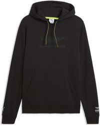 PUMA - X Aston Martin Aramco F1 Team Essentials Hoodie - Lyst
