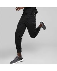 gym and workout clothes Mens Activewear Grey gym and workout clothes PUMA Activewear PUMA Fleece Big Tall Essentials Logo Sweatpants in Dark Gray Heather for Men 