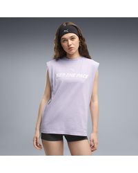 PUMA - Camiseta Sin Mangas Estampada Run Culture Collective Holgada Y Con Efecto Lavado Para Mujer, Ropa, Morado - Lyst