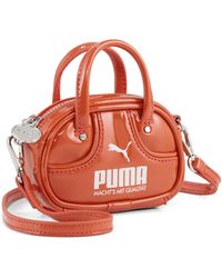 PUMA - 1976 Pocket 0.5L Grip Bag - Lyst