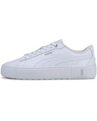 white platform pumas