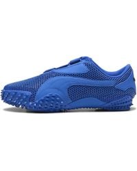 PUMA - Mostro Sneakers Schuhe, Mountain/Schwarz - Lyst