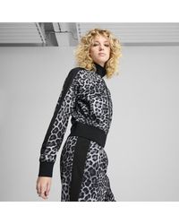 PUMA - Chaqueta De Chándal Corta Con Estampado Integral T7 Leo Luxe Para Mujer, Ropa, Negro - Lyst