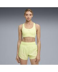 PUMA - 4Keeps Run Moisture Wicking, Mid Impact Sports Bra - Lyst