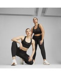 PUMA - 4Keeps Run Moisture Wicking, Mid Impact Sports Bra - Lyst