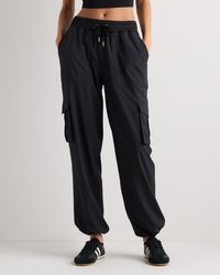 Quince - Performance Tech Cargo Mid-Rise Pants, Recycled Polyester Spandex - Lyst