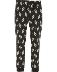 tuta leopardata kenzo