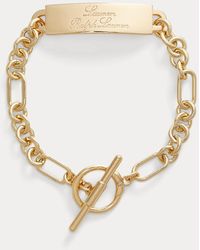 Lauren by Ralph Lauren - Bracelet flexible doré à logo - Lyst