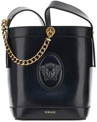 Versace - Leather Bucket Bag With Medusa Patch - Lyst