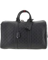 Gucci - Leather Medium 'Gg Emblem' Duffle Bag - Lyst