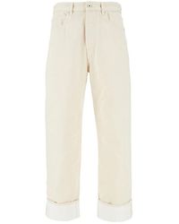 Bottega Veneta - Stone Washed Jeans With Cuffs - Lyst