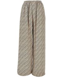 Balenciaga - Silk Pants With Monogram Print - Lyst
