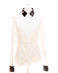 Dolce & Gabbana Weiße Langarmbluse mit schwarzen Kontrasten