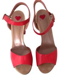 Damen Love Moschino Absätze ab 44 € Lyst LOVE MOSCHINO High Heel Sandalette mit goldfarbenen Akzenten