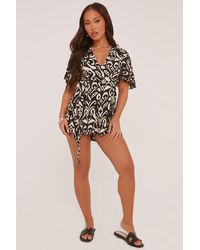 Rebellious Fashion - Abstract Print Frill Detail Playsuit - Lyst