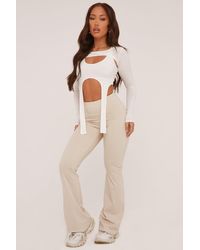 Rebellious Fashion - Ruched Back Flared Leg Trousers - Lyst