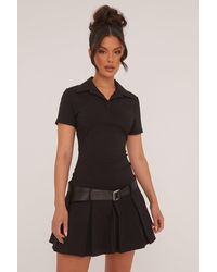 Rebellious Fashion - Pleated Hem Belt Detail Mini Dress - Lyst