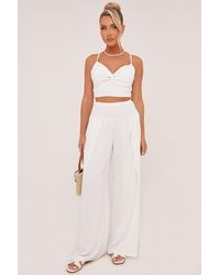Rebellious Fashion - Twist Front Cropped Top & Flared Leg Trouser Co-Ord Set - Lyst