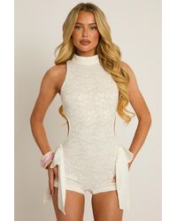 Rebellious Fashion - Lace Cut Out Bow Detail Playsuit - Lyst