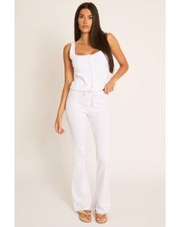 Rebellious Fashion - Button Front Sleeveless Top And Flare Leg Joggers Loungewear Co-Ord Set - Lyst