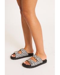 Rebellious Fashion - Contrast Monogram Buckle Detail Slider Sandals - Lyst