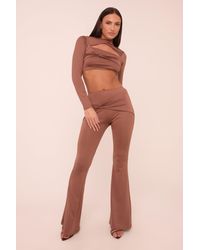 Rebellious Fashion - Twist Detail Long Sleeves Crop Top & Kick Flare Trousers Co-Ord Set - Lyst