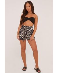 Rebellious Fashion - Abstract Print Tie Waist Woven Shorts - Lyst