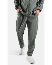 Reebok - Id Train Woven Jogger Pants - Lyst