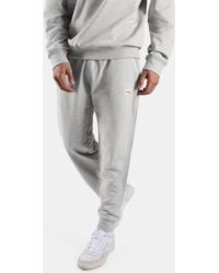 Reebok - Id Small Logo French Terry Jogger Track Pants - Lyst