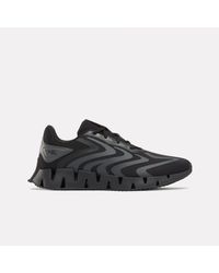 Reebok - Zig Rise Running Shoes - Lyst