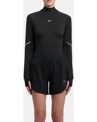 Reebok - Lux Speed Interlock Mock Neck Long Sleeve - Lyst