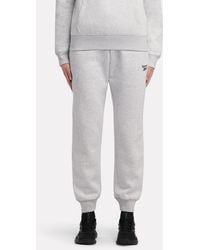 Reebok - Id Small Logo Fleece Cuffed Pants - Lyst