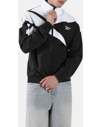 Reebok - Vector Track Top - Lyst