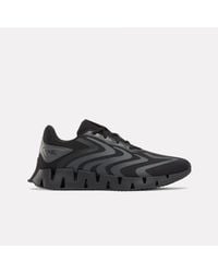Reebok - Zig Rise Running Shoes - Lyst