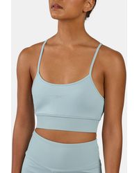 Reebok - Lux Peached Strappy Sports Bra - Lyst