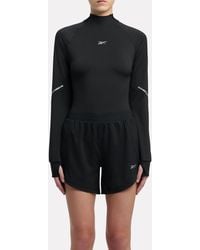 Reebok - Lux Speed Interlock Mock Neck Long Sleeve - Lyst