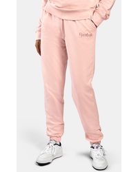 Reebok - Studded Logo Pants - Lyst