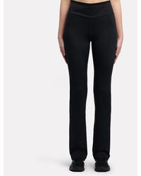 Reebok - Id Train High Rise Bootcut Leggings - Lyst