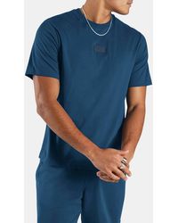 Reebok - Silicone Badge T-Shirt - Lyst