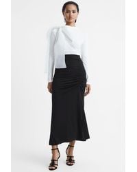 Reiss - Eleanor - Black High Rise Ruched Fitted Midi Skirt - Lyst