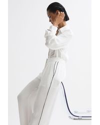 Reiss - Gina - Ivory Mid Rise Wide Leg Trousers - Lyst