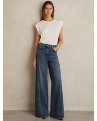 Reiss - Petite Twist Seam Wide Leg Jeans - Lyst