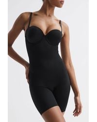 Spanx - Shapewear Firming Strapless Mid-thigh Bodysuit With Cups - Lyst