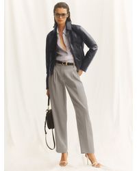 Reiss - Lyocell Tapered Pleated Trousers - Lyst